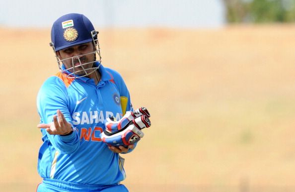 Indian cricketer Virender Sehwag walks b