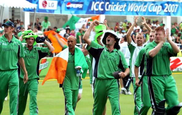 Irish cricketers and their fans celebrat