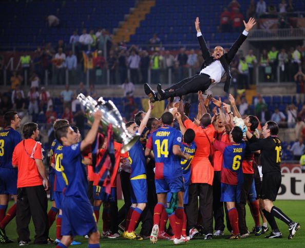 ROME - MAY 27:  Barcelona&#039;s Guardiola is  thrown into the air by his players as they celebrate winning the UEFA Champions League Final match against Manchester United at the Stadio Olimpico, in Rome, Italy.  