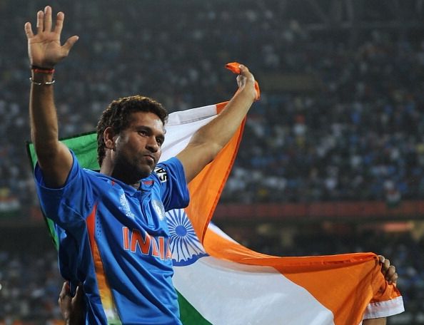 Indian cricketer Sachin Tendulkar waves