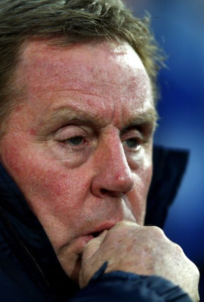  A pensive Harry Redknapp looks on during the Barclays Premier League match between Queens Park Rangers and Liverpool