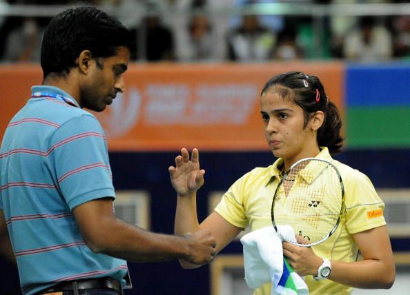 Indian badminton player Saina Nehwal (R)