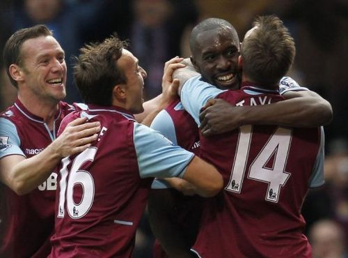 Carlton Cole (second-right) celebrates his equaliser