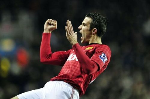 Manchester United's striker Robin Van Persie celebrates scoring