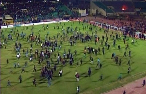 Al Masry fans stormed the pitch after their team beat the visitors from Cairo 3-1