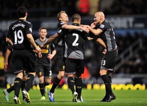 Liverpool's Glen Johnson (2nd R) celebrates scoring with Jonjo Shelvey (R) and Lucas Leiva (3rd R)