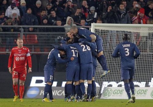 Paris Saint-Germain's Swedish forward Zlatan Ibrahimovic celebrates with teammates after scoring a goal