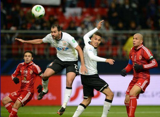 Corinthians forward Paolo Guerrero (2nd R) scores the only goal in the 1-0 defeat of Al Ahly in Japan on December 12, 2012