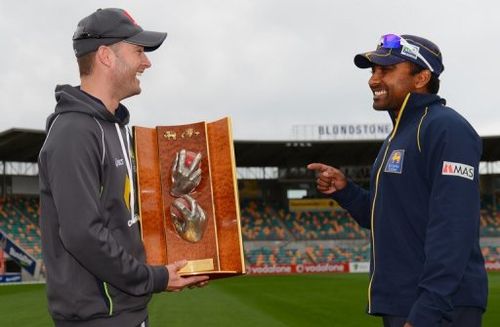 Michael Clarke (left) and Mahela Jaywardena with the Warne/Murali Trophy in Hobart on December 13, 2012.