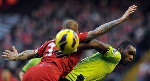 Aston Villa&#039;s Christian Benteke (R) and Liverpool&#039;s Martin Skrtel compete in Liverpool on December 15, 2012