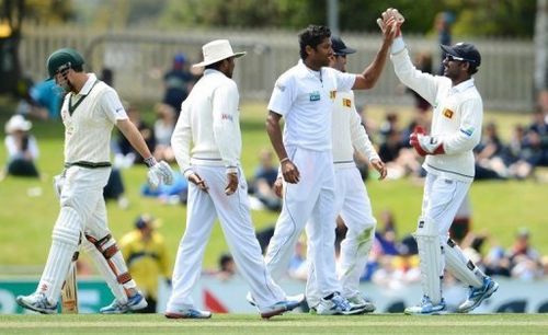 Chanaka Welegedara (3rd R) celebrates after dismissing Ed Cowan (L) on December 17, 2012 in Hobart