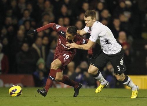 Newcastle United's French midfielder Hatem Ben Arfa (left) at Craven Cottage stadium in London on December 10, 2012.