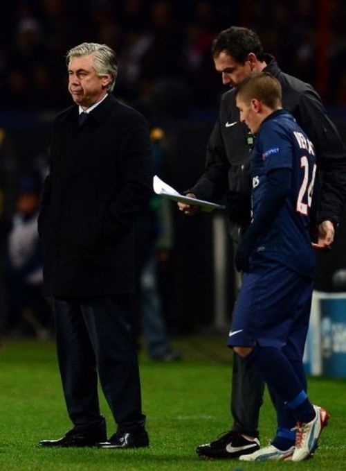 Paris Saint-Germain's coach Carlo Ancelotti (left) on December 4, 2012 at the Parc des Princes stadium in Paris