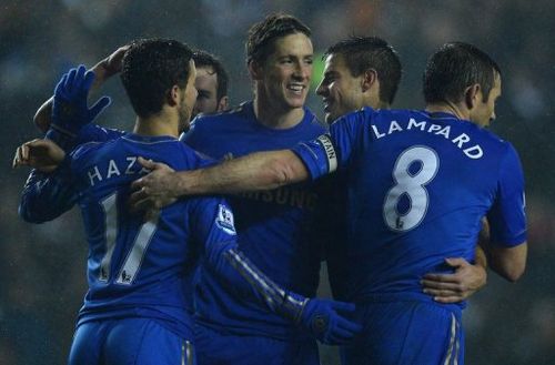 Chelsea's Fernando Torres (C) celebrates after scoring during the League Cup match against Leeds on December 19, 2012
