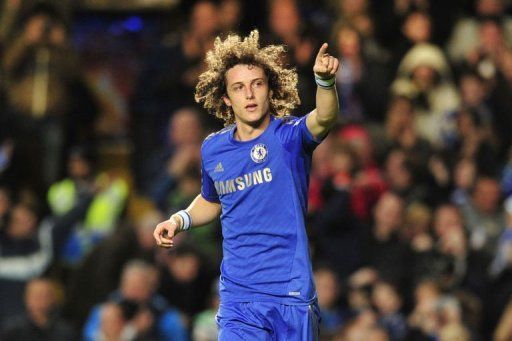Chelsea&#039;s David Luiz celebrates scoring during the match between Chelsea and Aston Villa on December 23, 2012