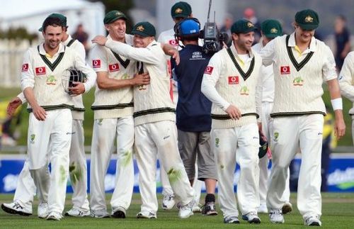 Australian team celebrate after bowling Sri Lanka out, in Hobart, on December 18, 2012