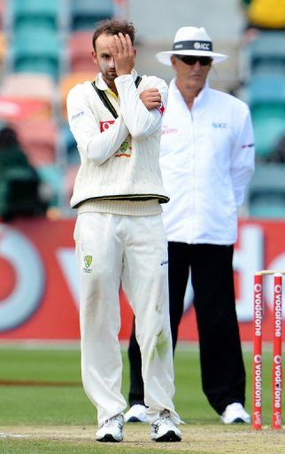 Australian spinner Nathan Lyon reacts after bowling to the Sri Lankan batsman, in Hobart, on December 18, 2012