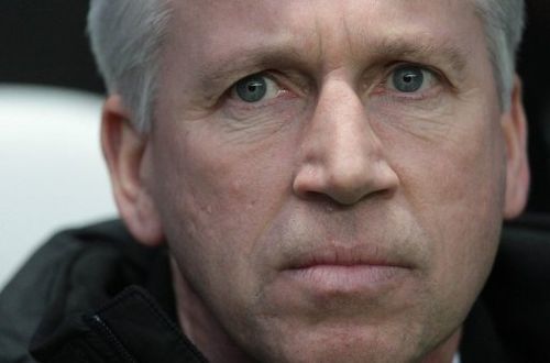 Newcastle United manager Alan Pardew looks on before a match against QPR at St James' Park on December 22, 2012