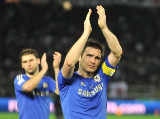 Frank Lampard acknowledges Chelsea fans after losing the Club World Cup final in Yokohama, Japan on December 16, 2012