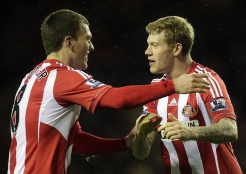 Sunderland's Craig Gardner (L) and James McClean (R) celebrate at The Stadium of Light on December 26, 2012