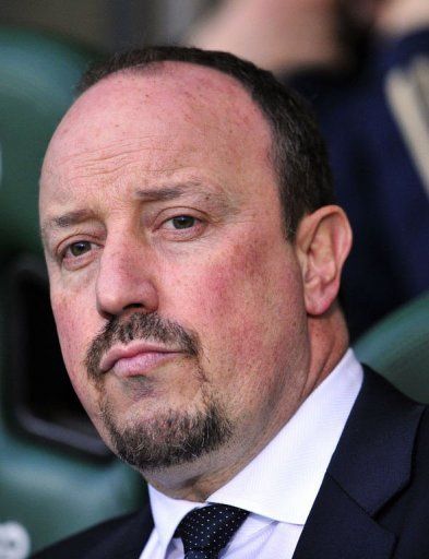 Chelsea interim manager Rafael Benitez takes his seat at Carrow Road stadium in Norwich on December 26, 2012