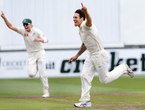 Australia's Mitchell Johnson (R) celebrates after dismissing Sri Lanka's Tillakaratne Dilshan, on December 28, 2012