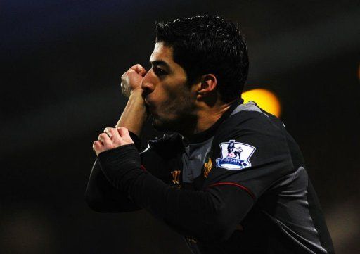 Liverpool&#039;s Luis Suarez celebrates after scoring at Loftus Road in London on December 30, 2012