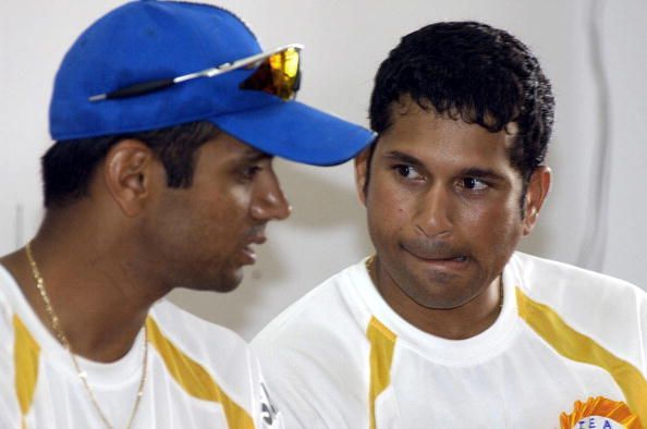 Indian cricketer Rahul Dravid (L) speaks