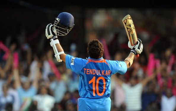 India cricketer Sachin Tendulkar raises