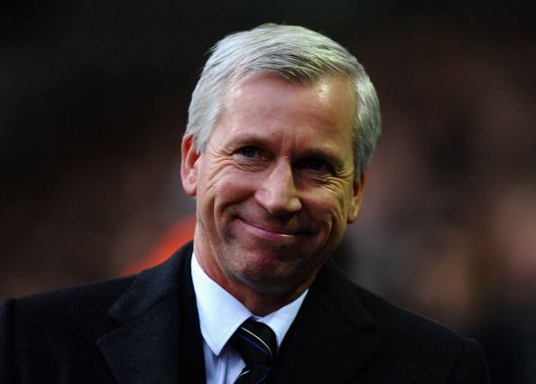 Alan Pardew of Newcastle United looks on  during the Barclays Premier League match between Bolton Wanderers and Newcastle United at the Reebok Stadium on December 26, 2011 in Bolton, England.  