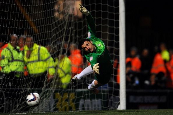 BRADFORD, ENGLAND - DECEMBER 11:  Goalkeeper Matt Duke of Bradford in action in the penalty shootout during the Capital One Cup quarter final match between Bradford City and Arsenal at the Coral Windows Stadium, Valley Parade on December 11, 2012 in Bradford, England.  )