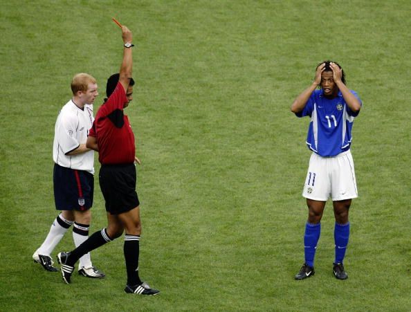 SHIZUOKA - JUNE 21:  Ronaldinho of Brazil is sent off during the FIFA World Cup Finals 2002 Quarter Finals match between England and Brazil played at the Shizuoka Stadium Ecopa, in Shizuoka, Japan on June 21, 2002. Brazil won the match 2-1. DIGITAL IMAGE. (Photo by Laurence Griffiths/Getty Images)
