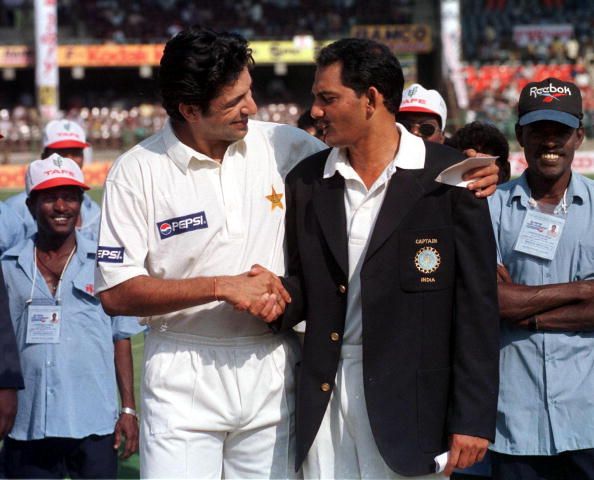 Pakistani cricket team captain Wasim Akram (L) and