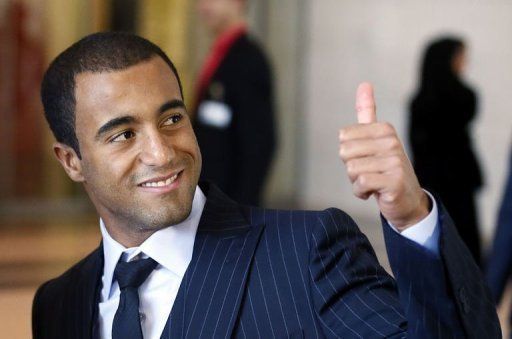 PSG midfielder Lucas Moura arrives for a press conference at the Museum of Islamic art in Doha on January 1, 2013