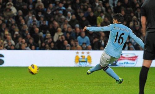 Manchester City's Sergio Aguero scores at The Etihad stadium in Manchester, on January 1, 2013