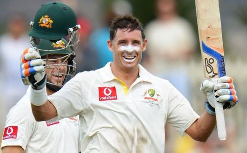 Australian batsman Mike Hussey celebrates his century against Sri Lanka in the first Test at Hobart on December 15, 2012