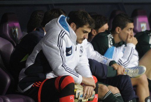 Real Madrid keeper and captain Iker Casillas watched from the bench as his side lost 3-2 to Malaga on December 22, 2012