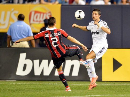 Cristiano Ronaldo (right) of Real Madrid against Mattia De Sciglio (left) of A.C. Milan. August 8, 2012 in New York