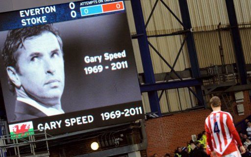 A tribute to Gary Speed is displayed on a screen at Goodison Park in Liverpool, on December 4, 2011