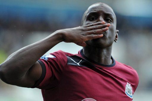 Demba Ba celebrates scoring at The Madejski Stadium, in Reading, England on September 29, 2012