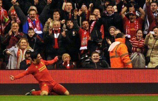 Liverpool&#039;s Luis Suarez celebrates scoring at Anfield in Liverpool, on January 2, 2013