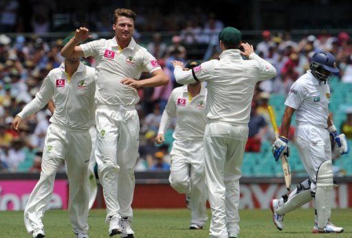 Jackson Bird (2nd L) celebrates dismissing Sri Lankan batsman Tillakaratne Dilshan on January 3, 2013