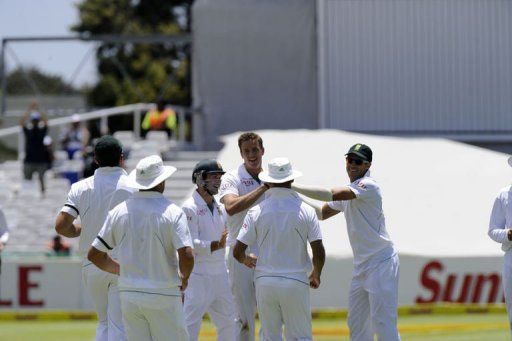 South Africa&#039;s Morne Morkel celebrates the dismissal of NZ batsman Dean Brownlie in Cape Town on January 4, 2013