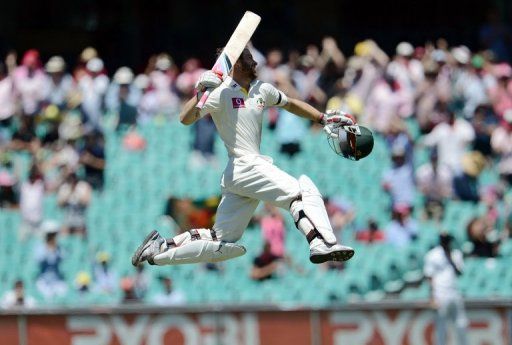 Matthew Wade celebrates his century on day three of the third Test between Australia and Sri Lanka on January 5, 2013