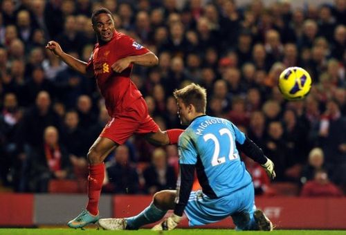 Raheem Sterling shoots wide past Sunderland goalkeeper Simon Mignolet in the Premier League on January 2, 2013