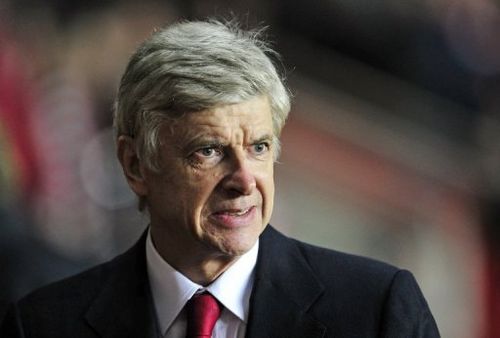 Arsenal's French manager Arsene Wenger grimaces ahead of his side's clash with Southampton on January 1, 2013