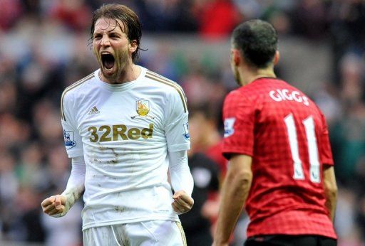 Swansea striker Michu celebrates his side&#039;s 1-1 home draw with Manchester United on December 23, 2012
