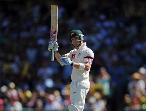 Australia's Michael Clarke raises his bat after reaching his 50 during the 3rd Test against Sri Lanka on January 4, 2013