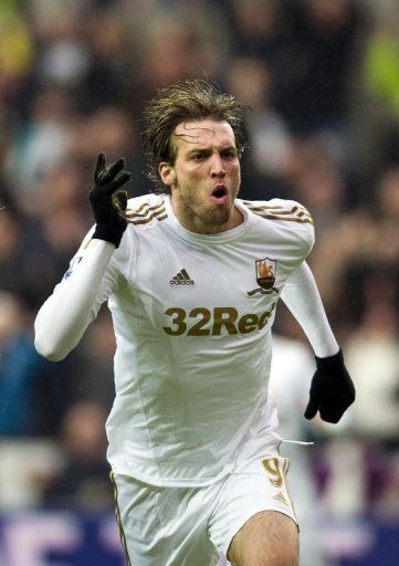 Swansea City striker Michu celebrates scoring against Arsenal in the FA Cup third round on January 6, 2013