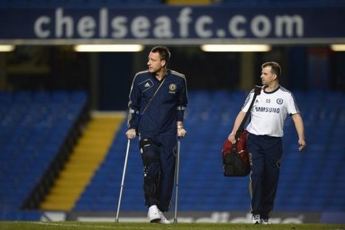 Chelsea's English defender John Terry walks on crutches on November 11, 2012.